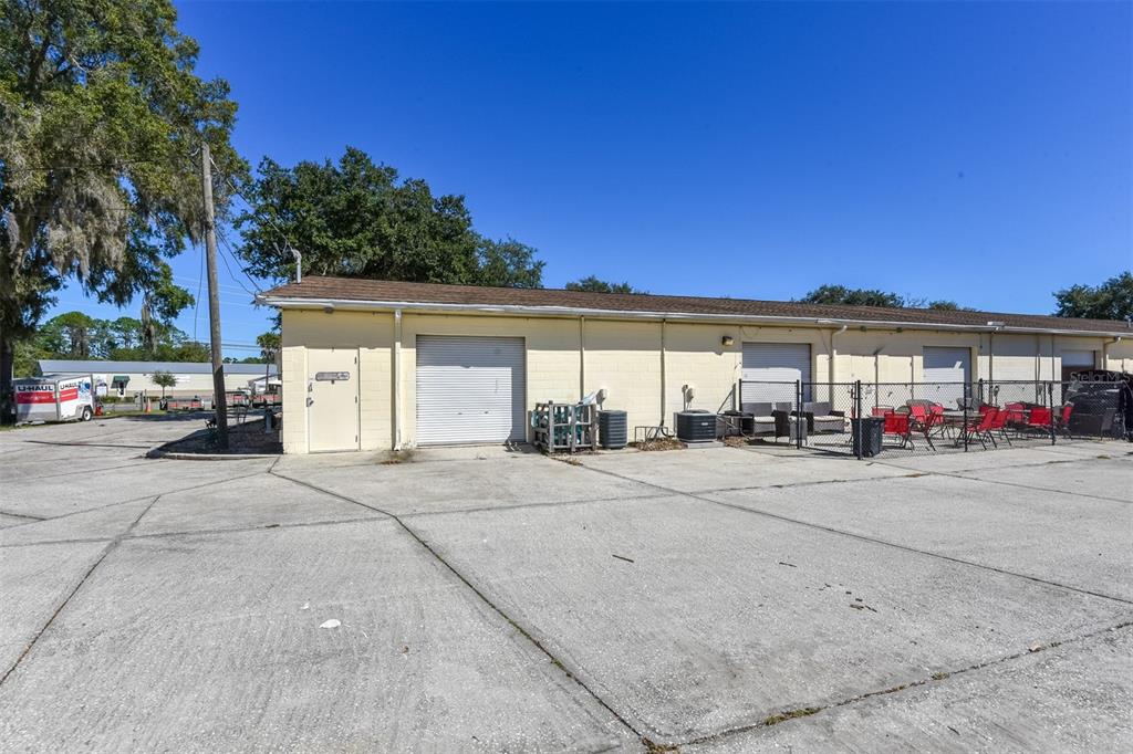 703 South State Street Bunnell, FL 32110 - Photo 19 of 25 a view of a car park in front of house