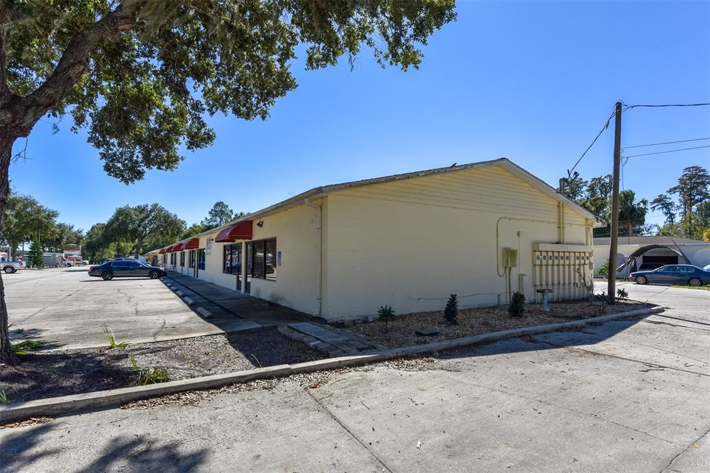 703 South State Street Bunnell, FL 32110 - Photo 25 of 25 a front view of a house with a yard