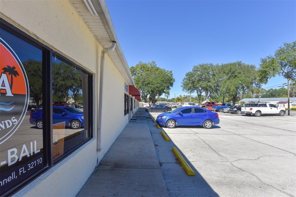 703 South State Street Bunnell, FL 32110 - Photo 10 of 25 a view of a two chairs in the balcony