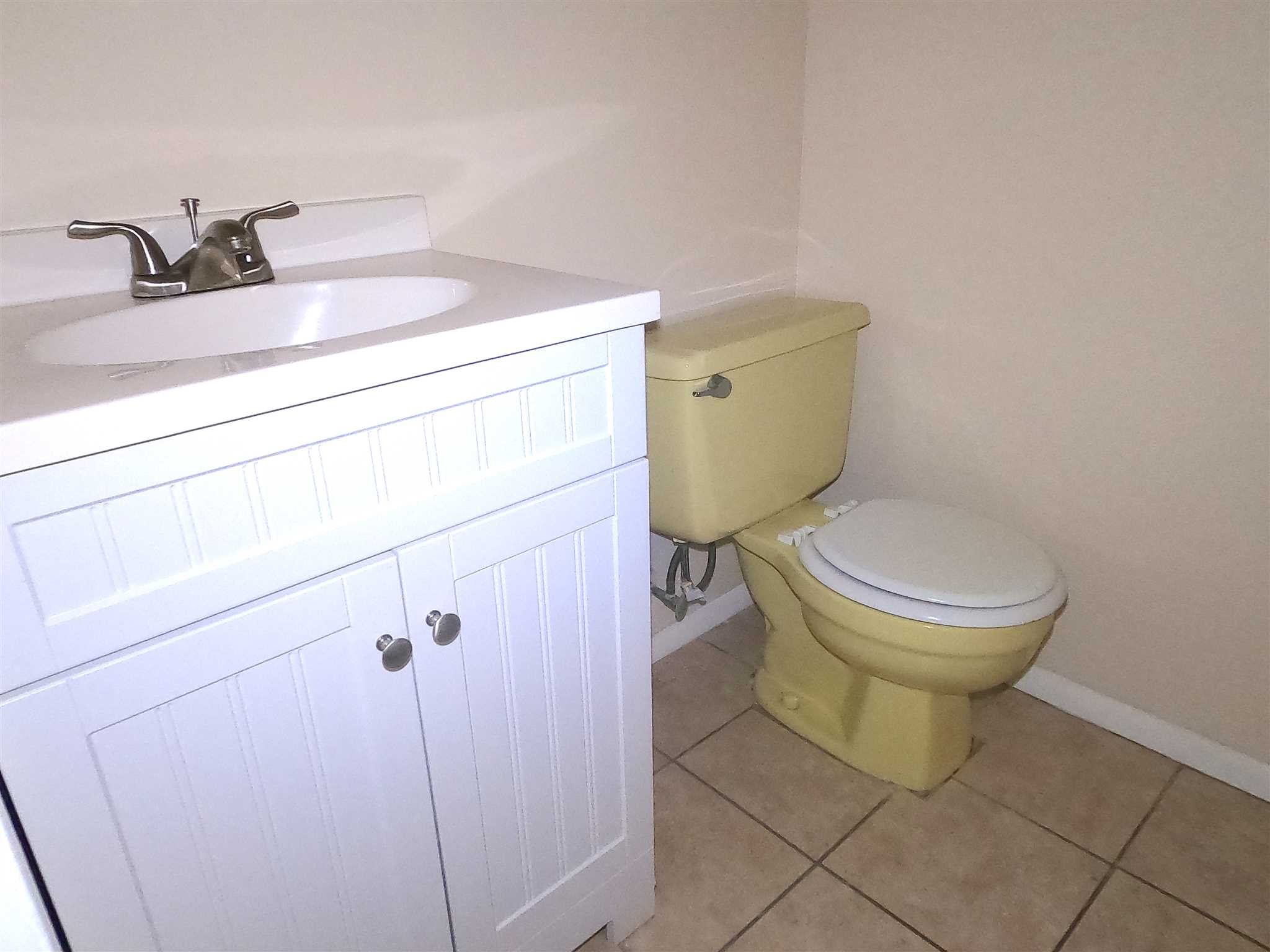 3 Hook Hyde Park, Unit 14A Poughkeepsie, NY 12601 - Photo 11 of 20 a bathroom with a toilet and a sink