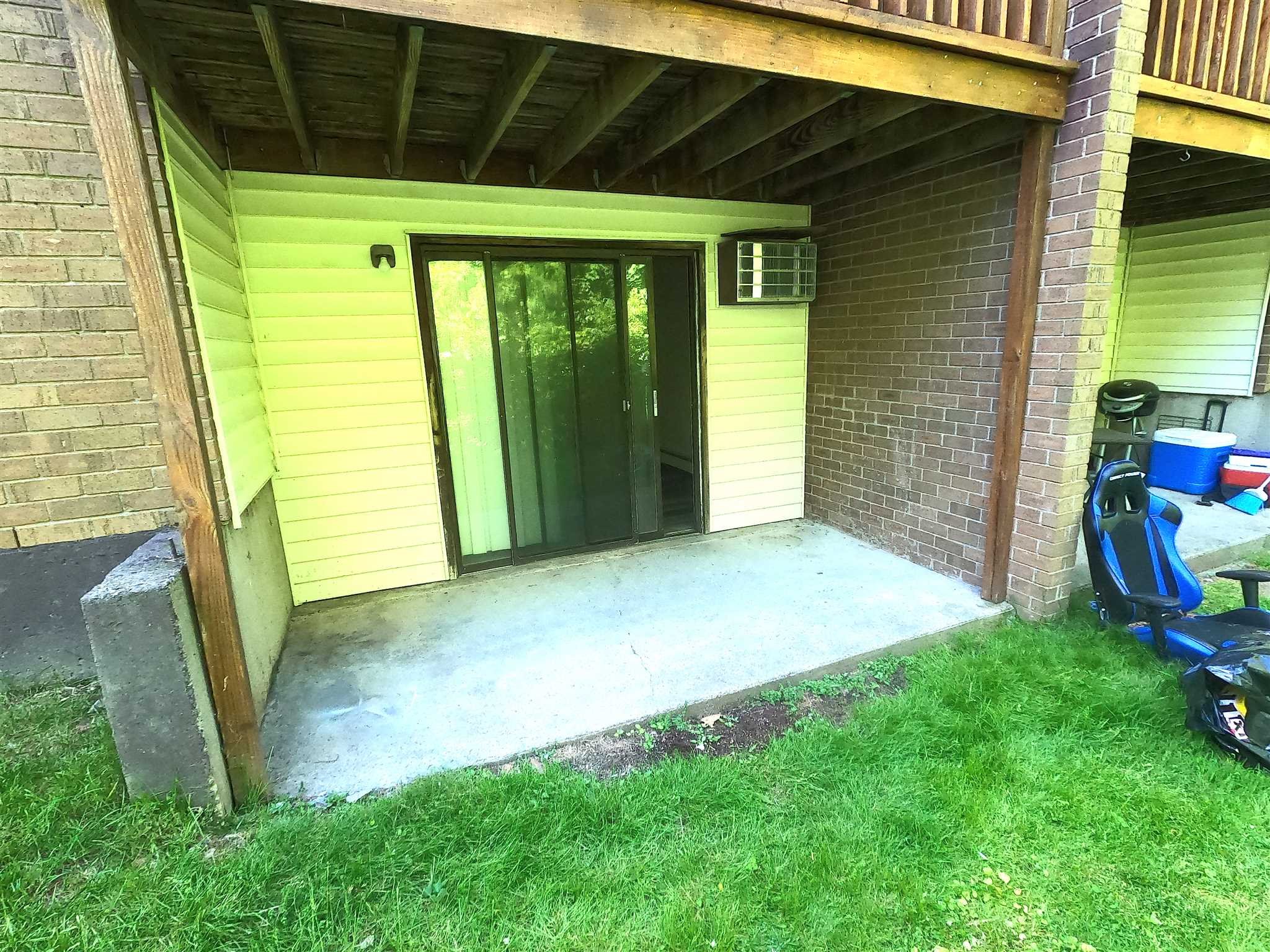 3 Hook Hyde Park, Unit 14A Poughkeepsie, NY 12601 - Photo 19 of 20 a view of a back yard from a room