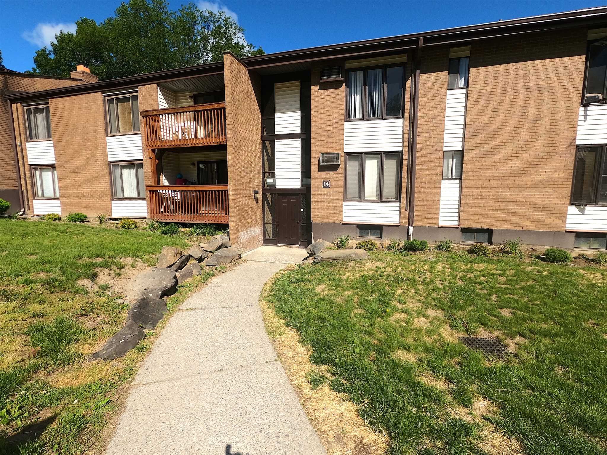 3 Hook Hyde Park, Unit 14A Poughkeepsie, NY 12601 - Photo 2 of 20 a house view with a garden space