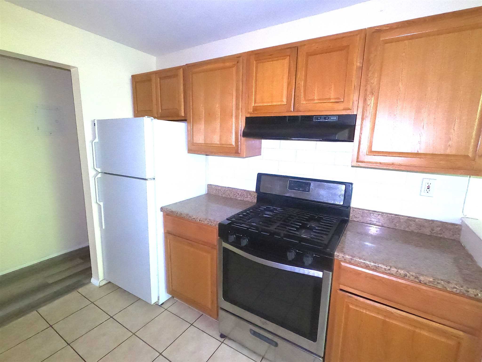 3 Hook Hyde Park, Unit 14A Poughkeepsie, NY 12601 - Photo 5 of 20 a kitchen with appliances cabinets and a counter top space