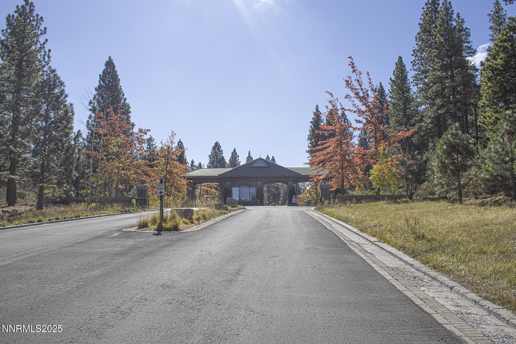 177 Nottingham Court Reno, NV 89511 - Photo 3 of 22 a view of a road with a building in the background