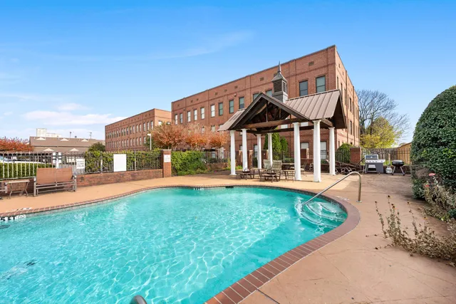 a view of a bathroom with a shower curtain