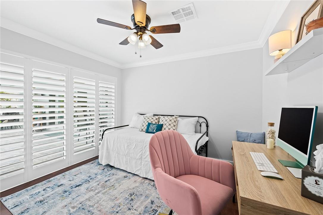 1621 Northwest 10th Street Boca Raton, FL 33486 - Photo 16 of 25 a bedroom with furniture and a window