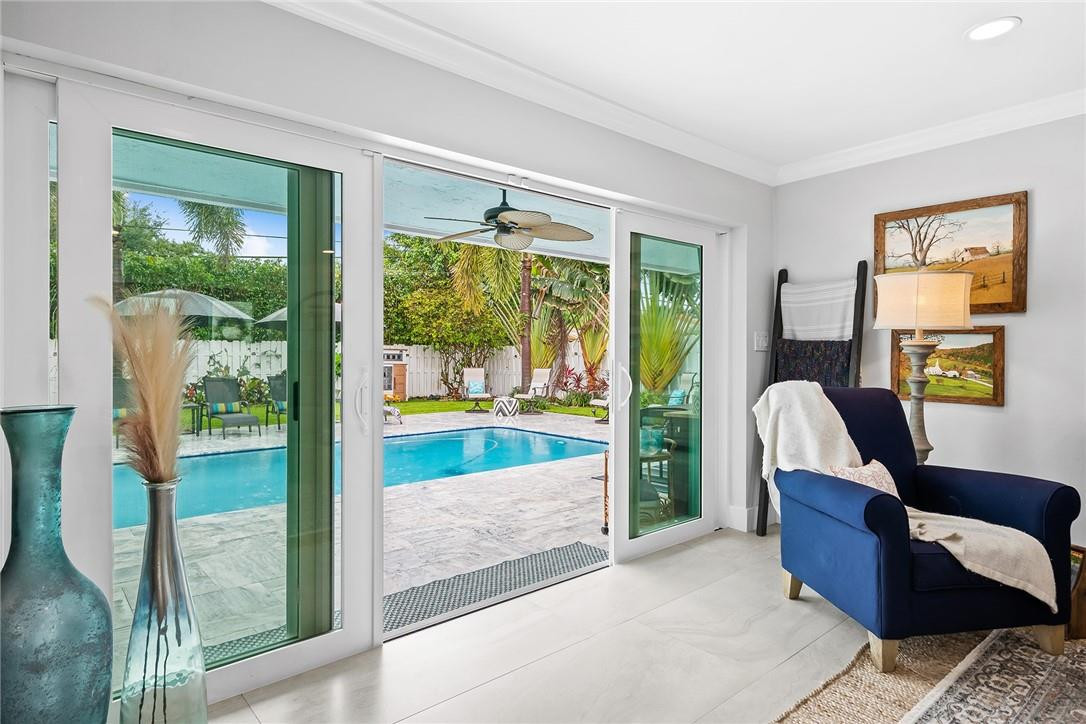 1621 Northwest 10th Street Boca Raton, FL 33486 - Photo 8 of 25 a living room with furniture and a window
