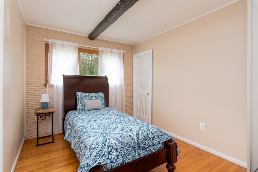 40 Riley Road Northborough, MA 01532 - Photo 17 of 24 a bedroom with a bed and a window