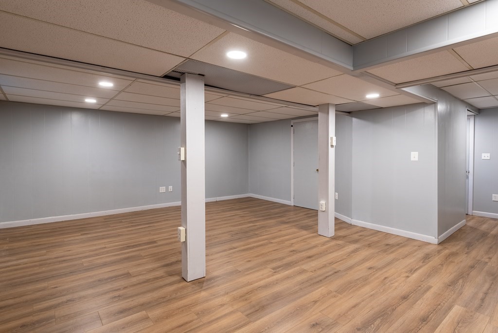 40 Riley Road Northborough, MA 01532 - Photo 18 of 24 an empty room with wooden floor