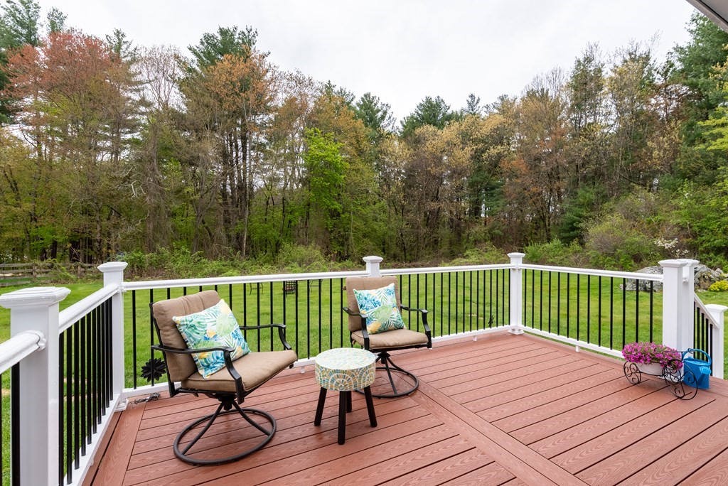 40 Riley Road Northborough, MA 01532 - Photo 4 of 24 a view of a deck with furniture