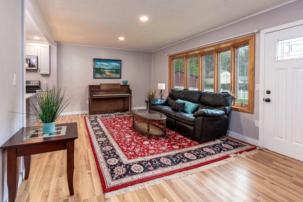 40 Riley Road Northborough, MA 01532 - Photo 7 of 24 a living room with furniture and a rug