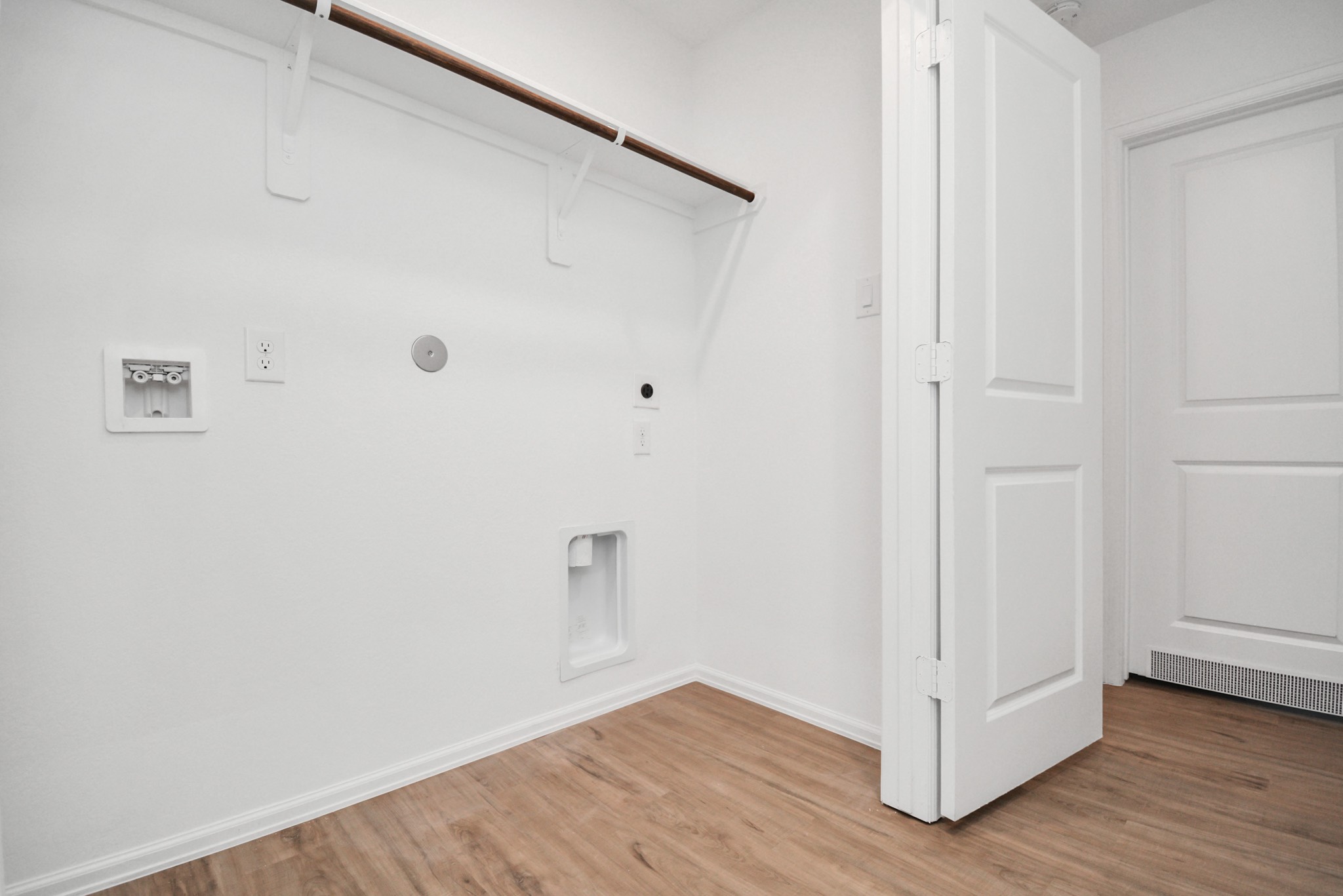 27023 Rimini Point Drive Katy, TX 77493 - Photo 12 of 15 a view of an empty room with wooden floor
