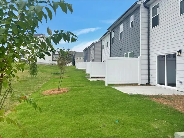 a view of a backyard with a garden