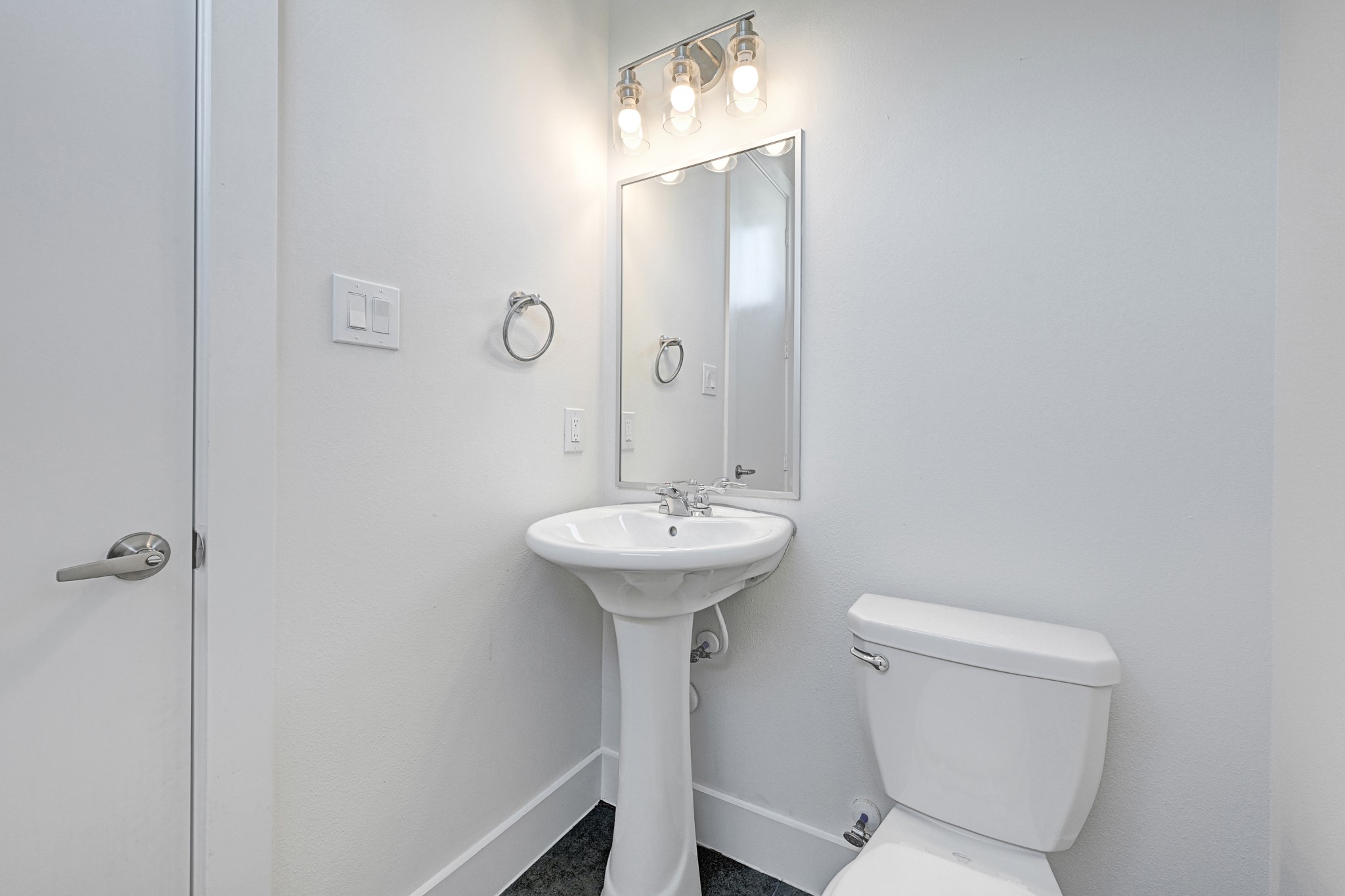 3313 Baer Street Houston, TX 77020 - Photo 17 of 26 a bathroom with a sink a toilet and shower