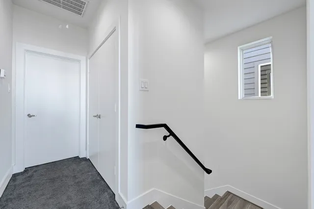 a view of hallway with stairs