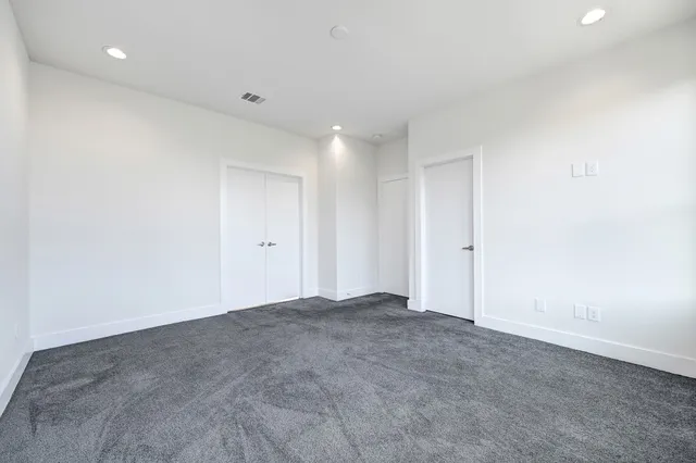 a view of an empty walk in closet
