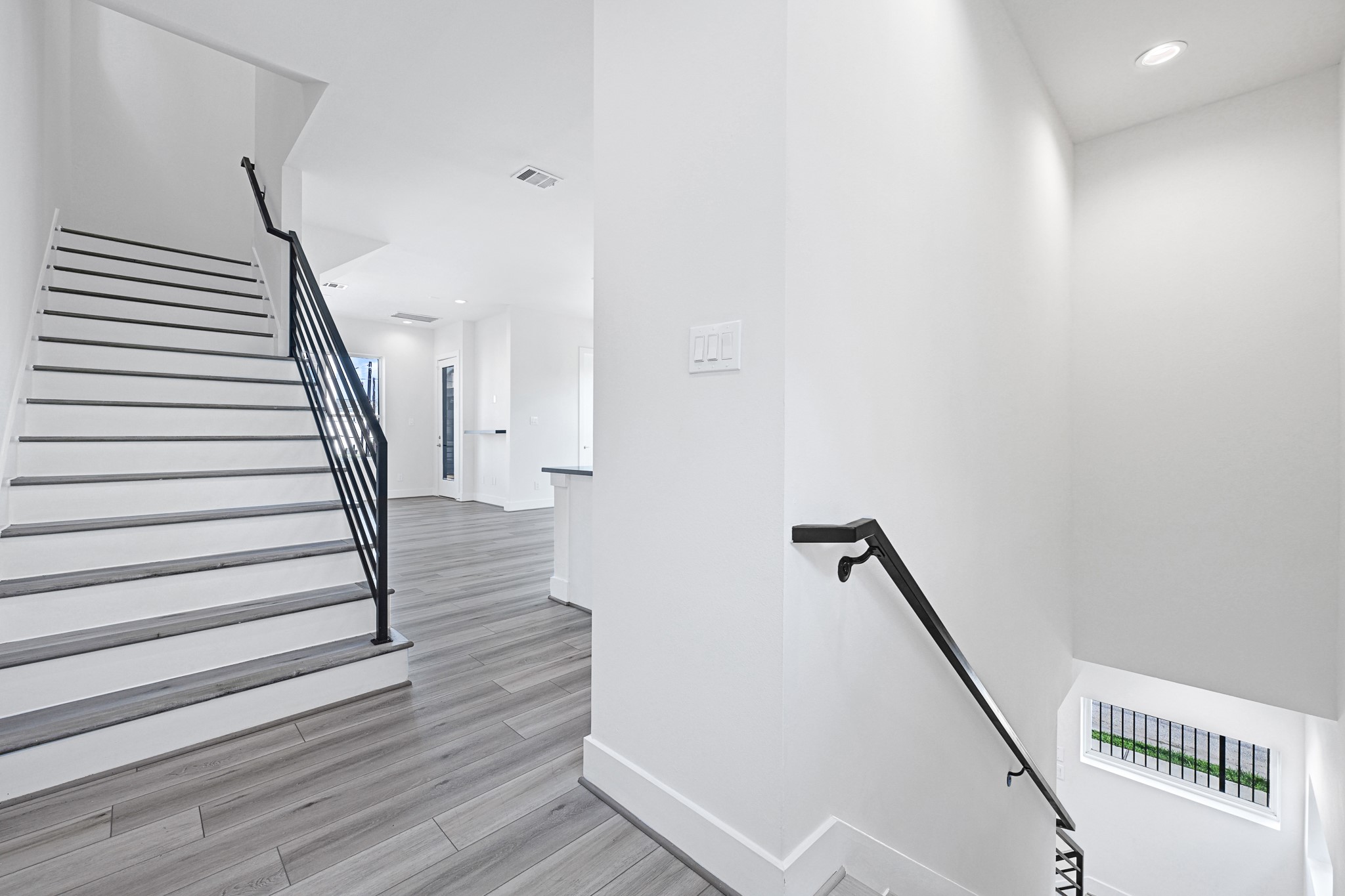 3313 Baer Street Houston, TX 77020 - Photo 8 of 26 a view of entryway with wooden floor