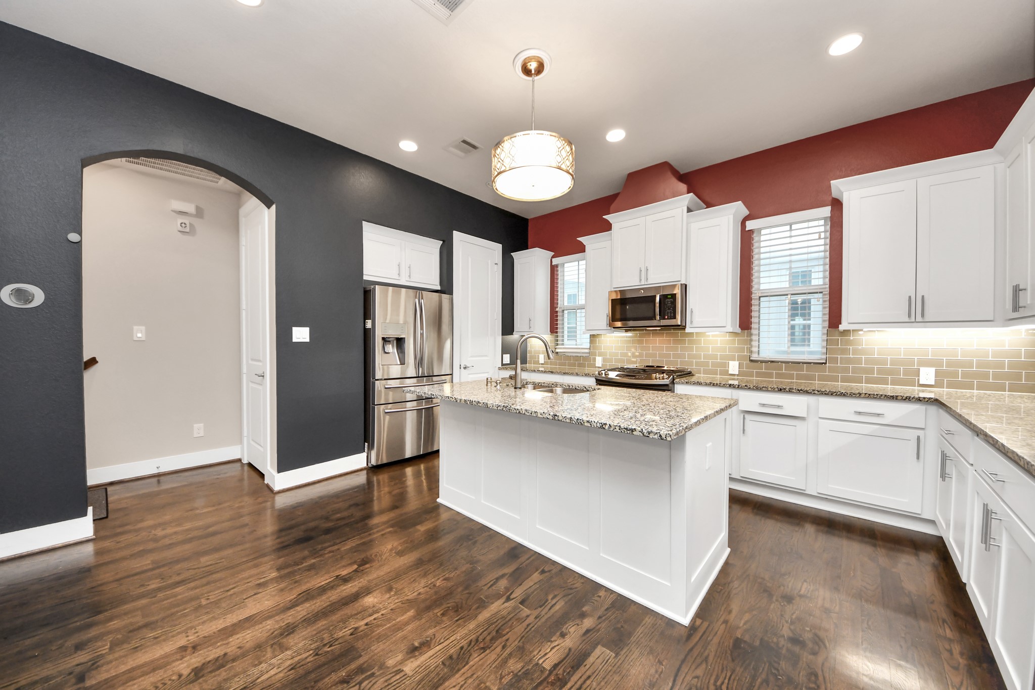 2704 Freund Street Houston, TX 77003 - Photo 15 of 45 a large kitchen with cabinets