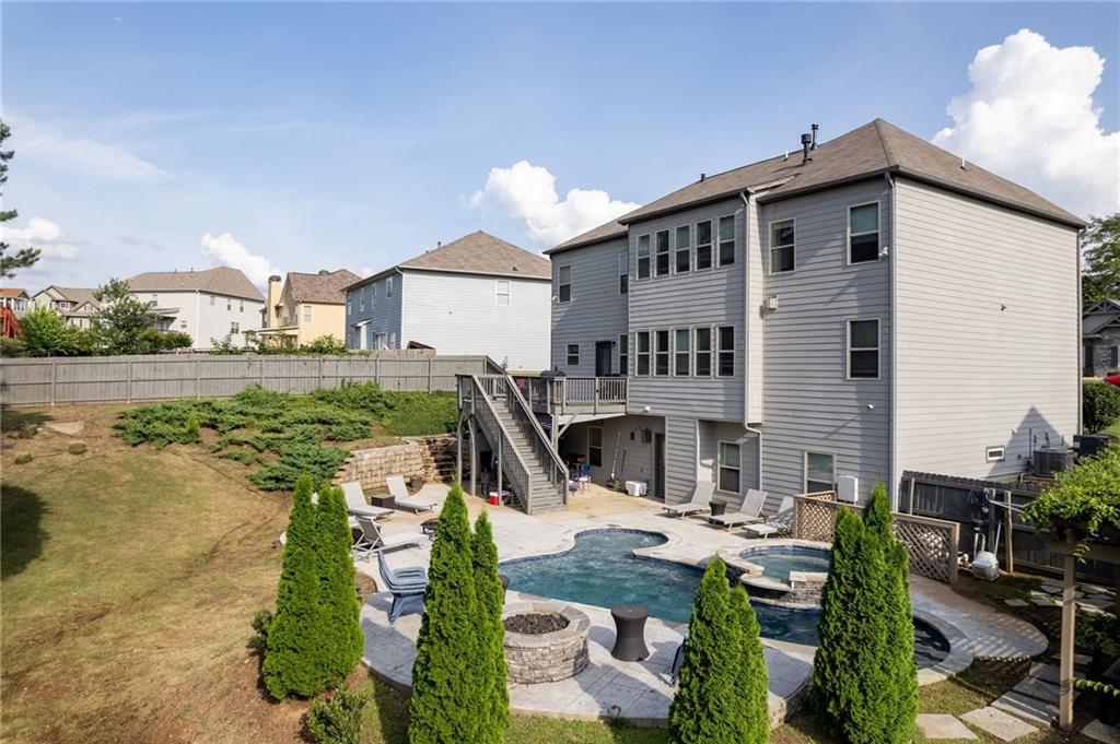 108 Fountain Oak Villa Rica, GA 30180 - Photo 3 of 45 a view of a house with backyard and sitting area