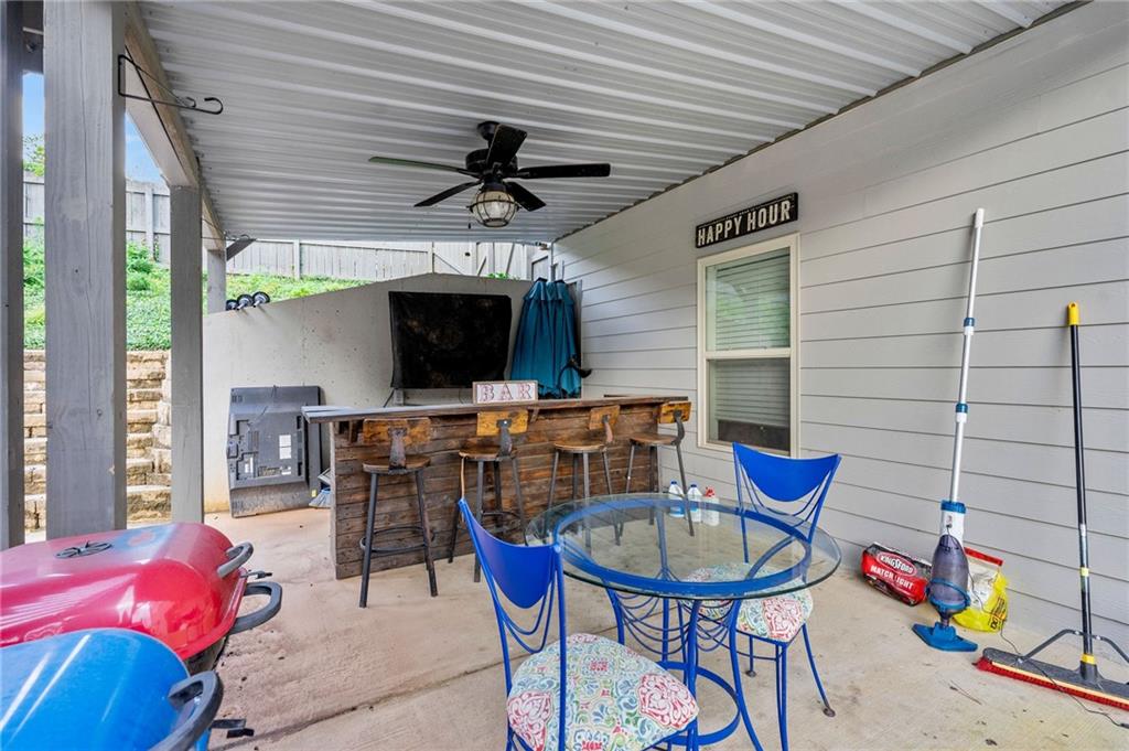 108 Fountain Oak Villa Rica, GA 30180 - Photo 40 of 45 a view of a livingroom with furniture and a flat screen tv