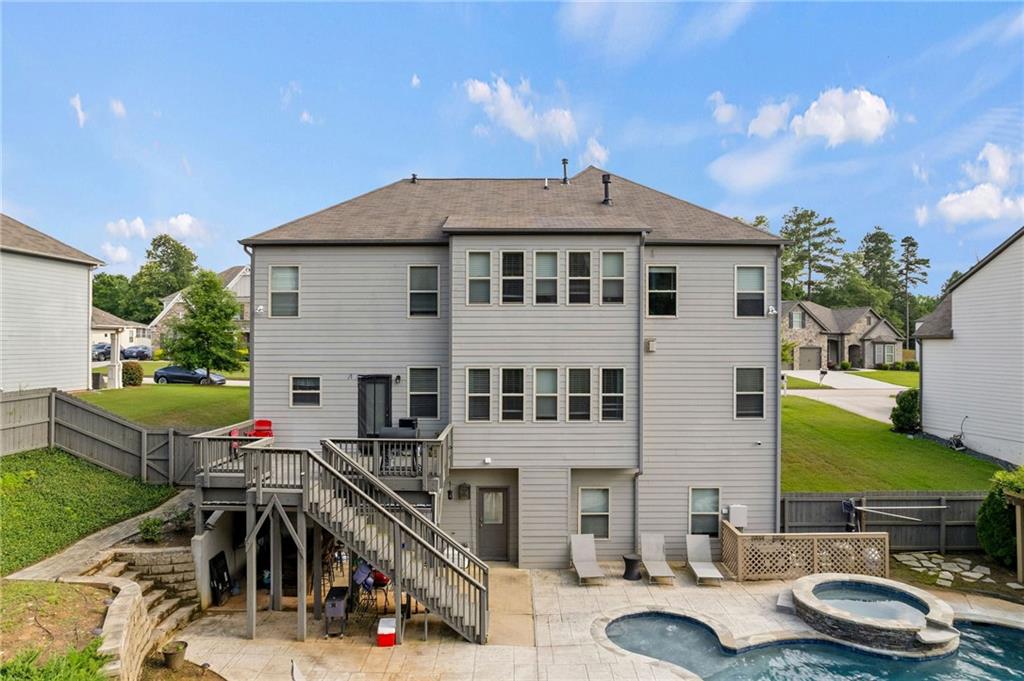 108 Fountain Oak Villa Rica, GA 30180 - Photo 45 of 45 a roof deck with table and chairs a barbeque with potted plants