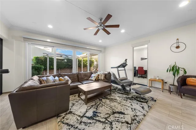 a living room with furniture and window