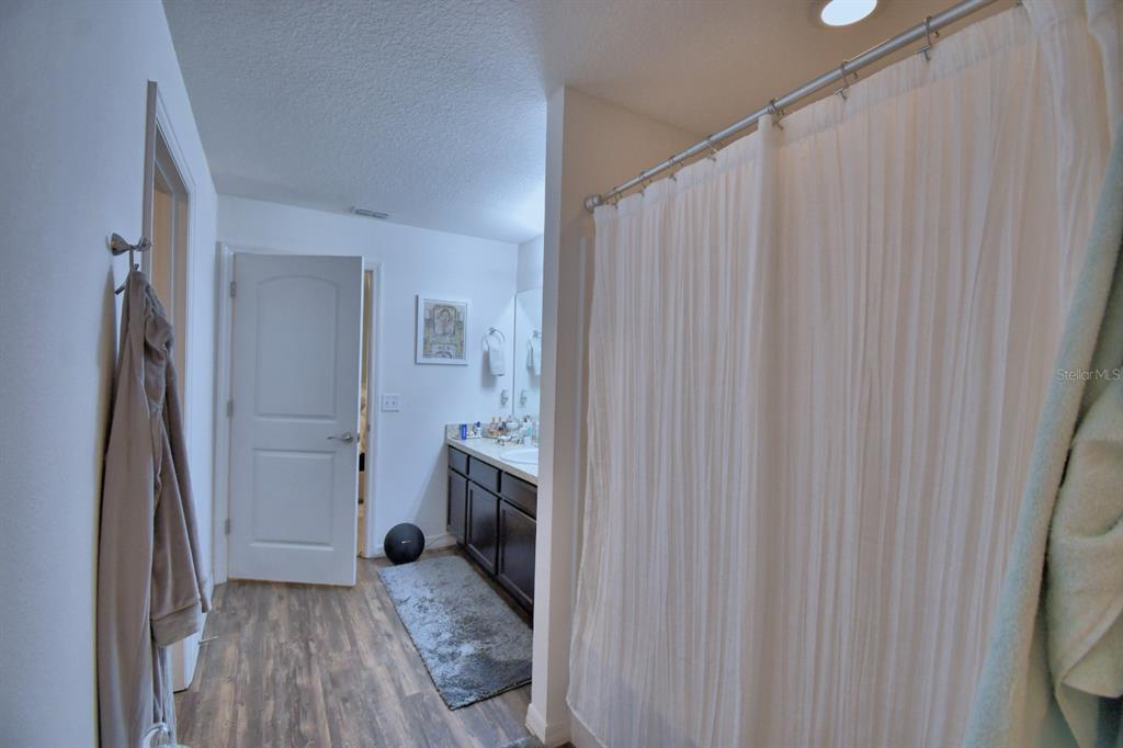 6286 Manitoba Drive Lakeland, FL 33805 - Photo 18 of 28 a bathroom with a sink and a mirror