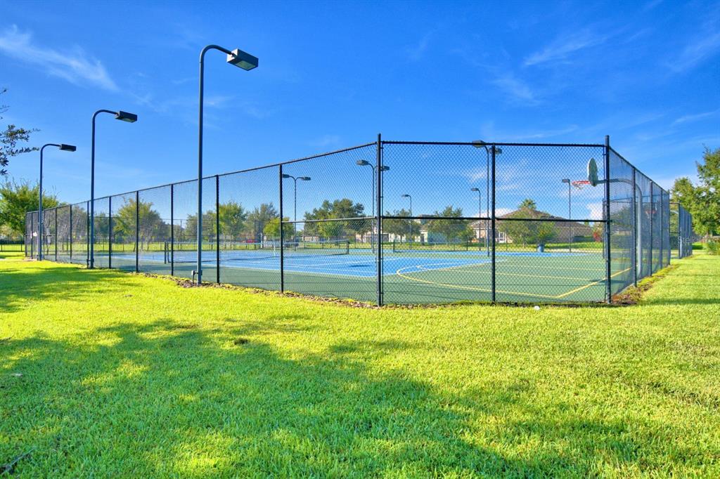 6286 Manitoba Drive Lakeland, FL 33805 - Photo 23 of 28 a view of a house with a big yard