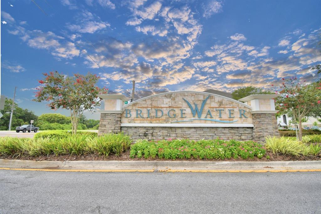 6286 Manitoba Drive Lakeland, FL 33805 - Photo 24 of 28 a front view of a house with a garden