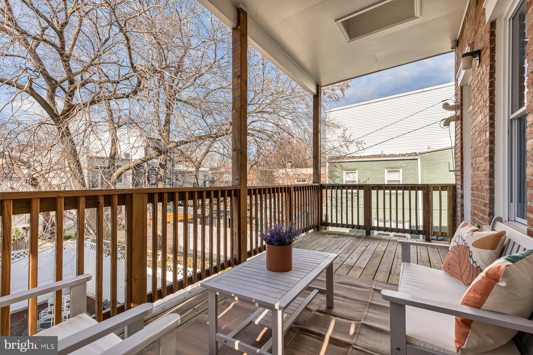 1606 5th Street Northwest, Unit 2 Washington, DC 20001 - Photo 24 of 34 a view of a balcony with wooden floor
