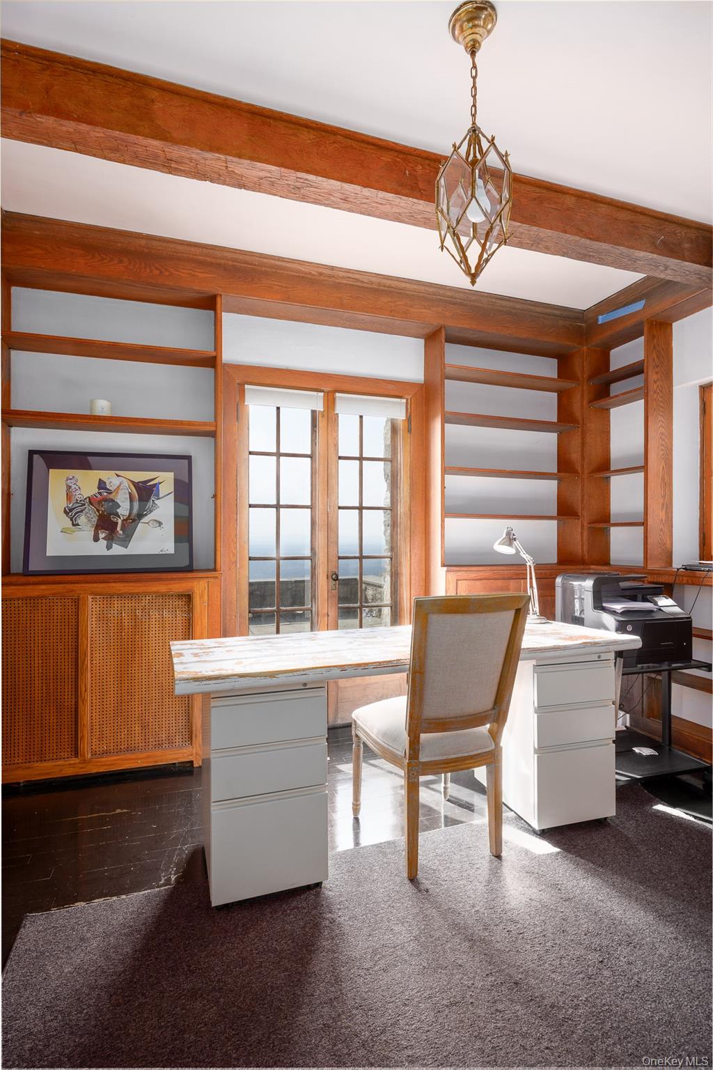 401 Woodmont Road Hopewell Junction, NY 12533 - Photo 12 of 50 a room with a table chairs and a chandelier