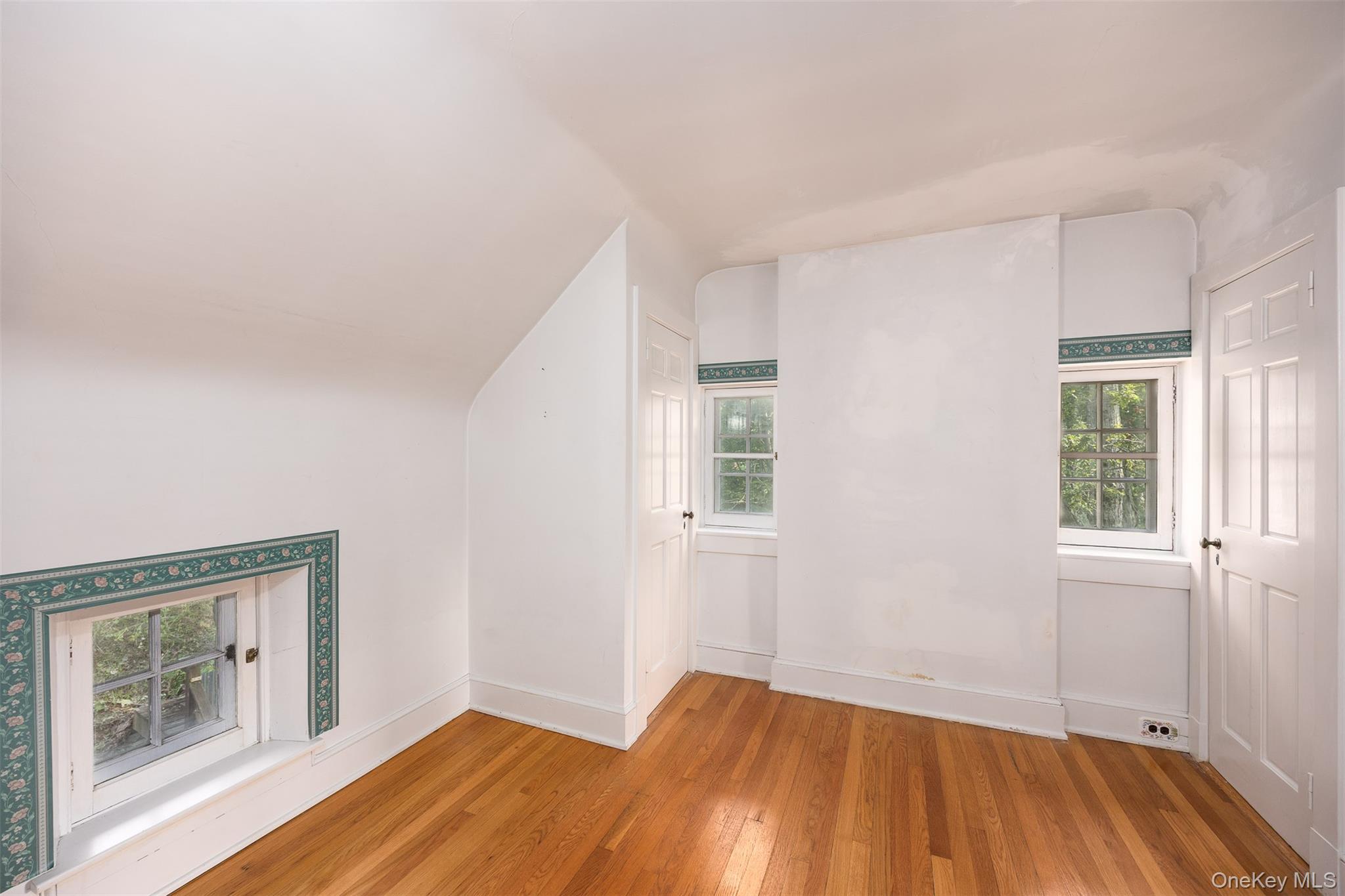 401 Woodmont Road Hopewell Junction, NY 12533 - Photo 17 of 50 a view of empty room with wooden floor and fan