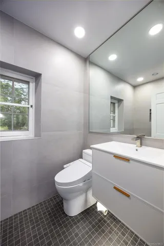 a room with furniture and a window