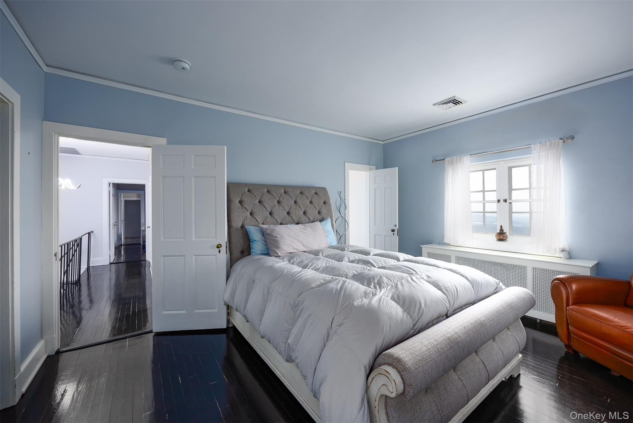 401 Woodmont Road Hopewell Junction, NY 12533 - Photo 21 of 50 a bedroom with a bed couch and a window