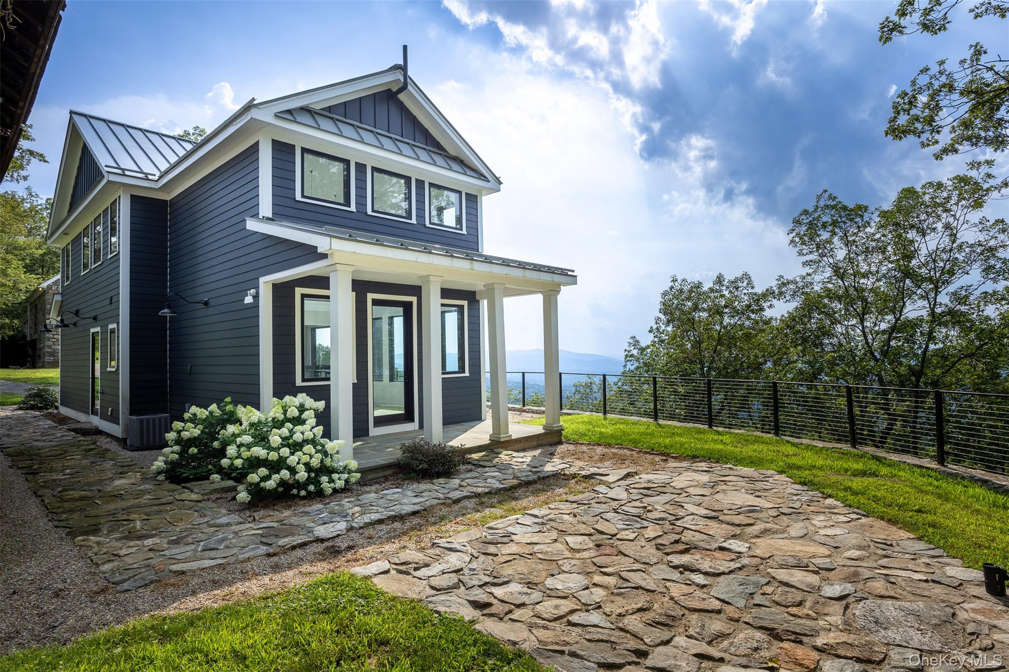 401 Woodmont Road Hopewell Junction, NY 12533 - Photo 24 of 50 a front view of a house with garden