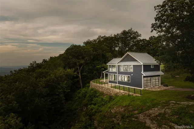 a view of a living room with a large window