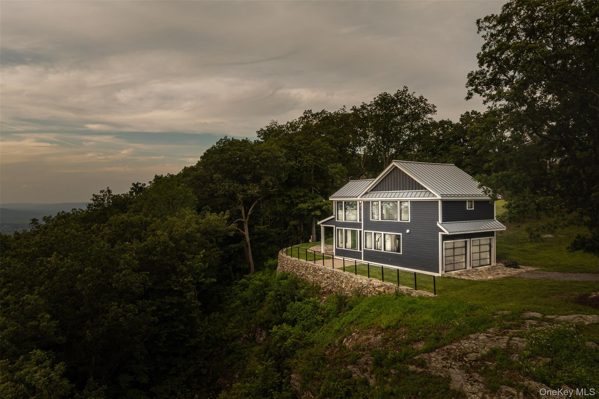 401 Woodmont Road Hopewell Junction, NY 12533 - Photo 26 of 50 a front view of a house with a yard and garage