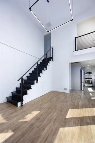 a kitchen with a stove a sink and a refrigerator