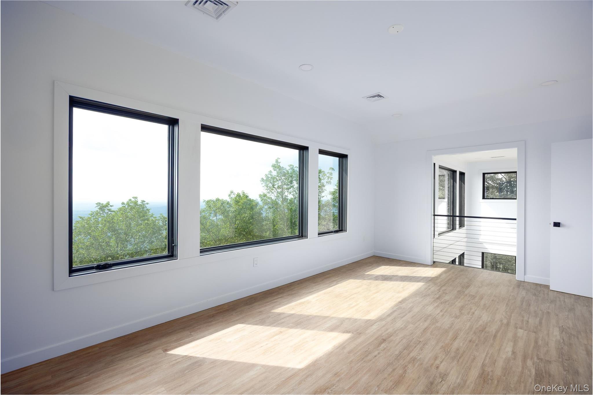 401 Woodmont Road Hopewell Junction, NY 12533 - Photo 31 of 50 a bedroom with a bed and a large window