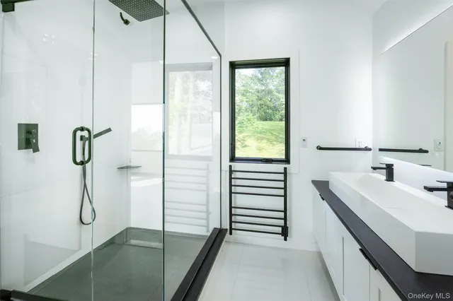 a view of a yard with porch and wooden floor