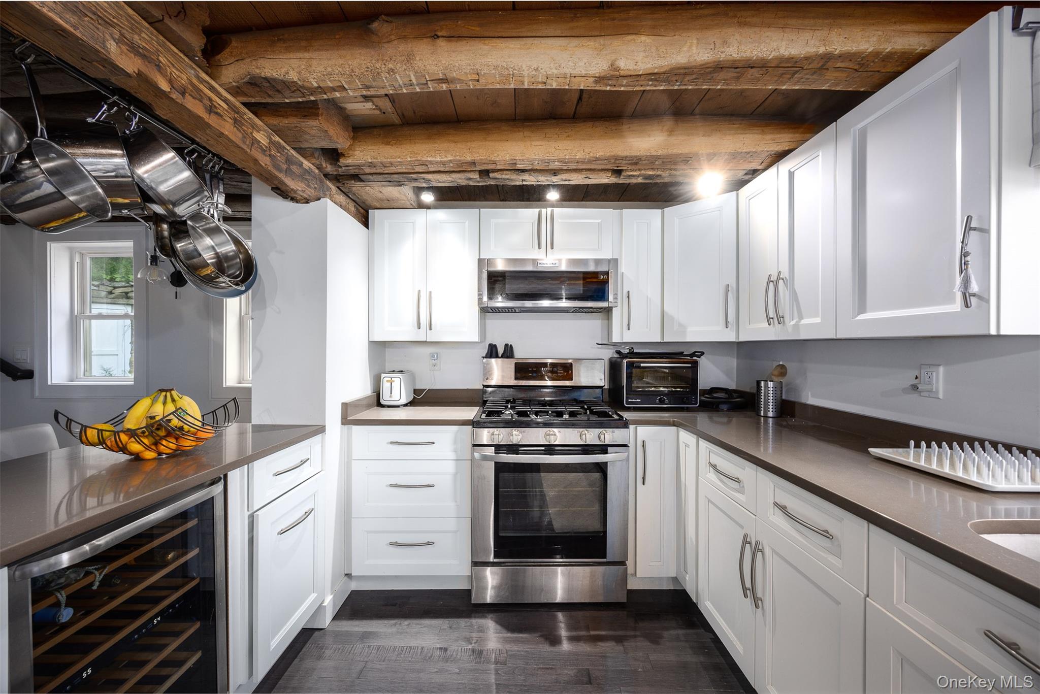 401 Woodmont Road Hopewell Junction, NY 12533 - Photo 37 of 50 a kitchen with stainless steel appliances granite countertop a sink a stove a microwave and cabinets
