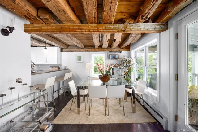 a bed room with two bed and a large window