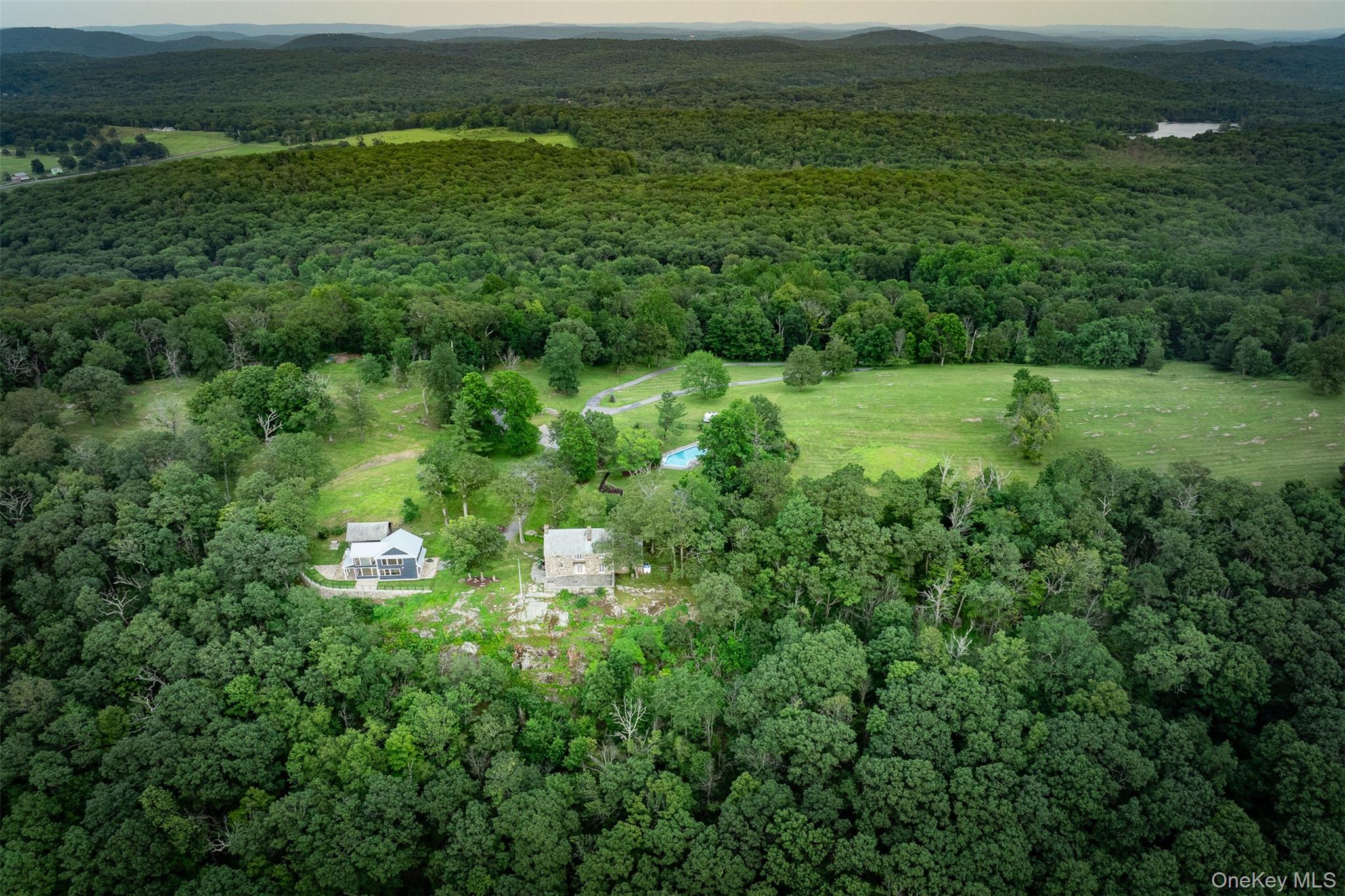 401 Woodmont Road Hopewell Junction, NY 12533 - Photo 50 of 50 a view of a green yard with large trees