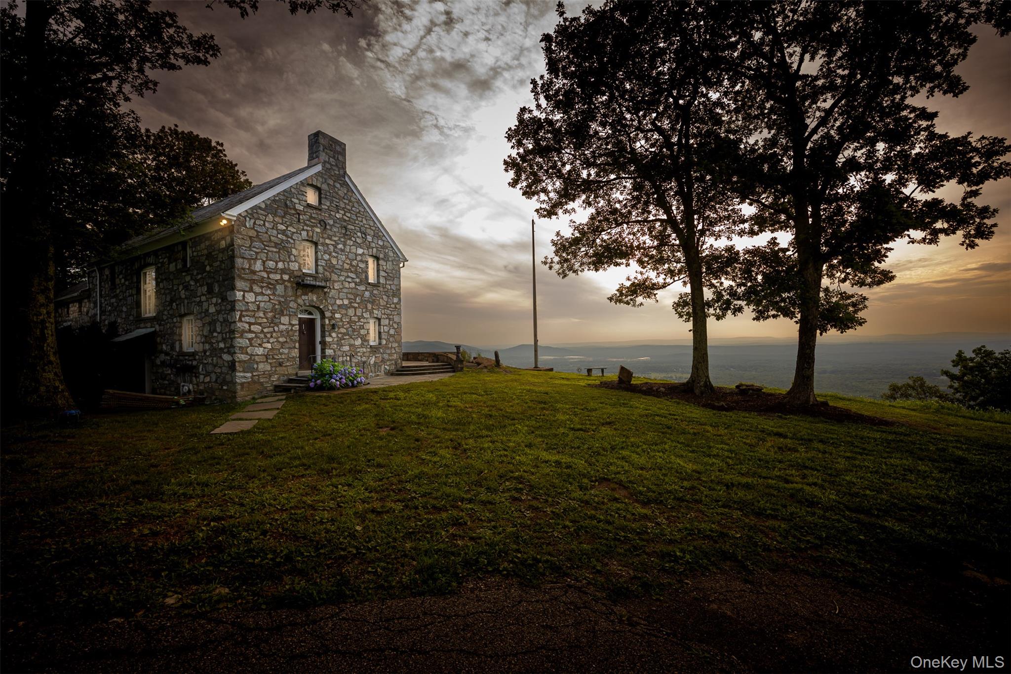 401 Woodmont Road Hopewell Junction, NY 12533 - Photo 5 of 50 a front view of a house with garden