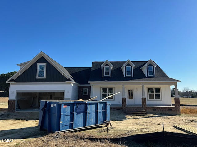 205 Big Pine Road Clayton, NC 27520 - Photo 2 of 22 a front view of a house with a yard