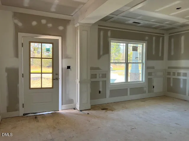 an empty room that has a window