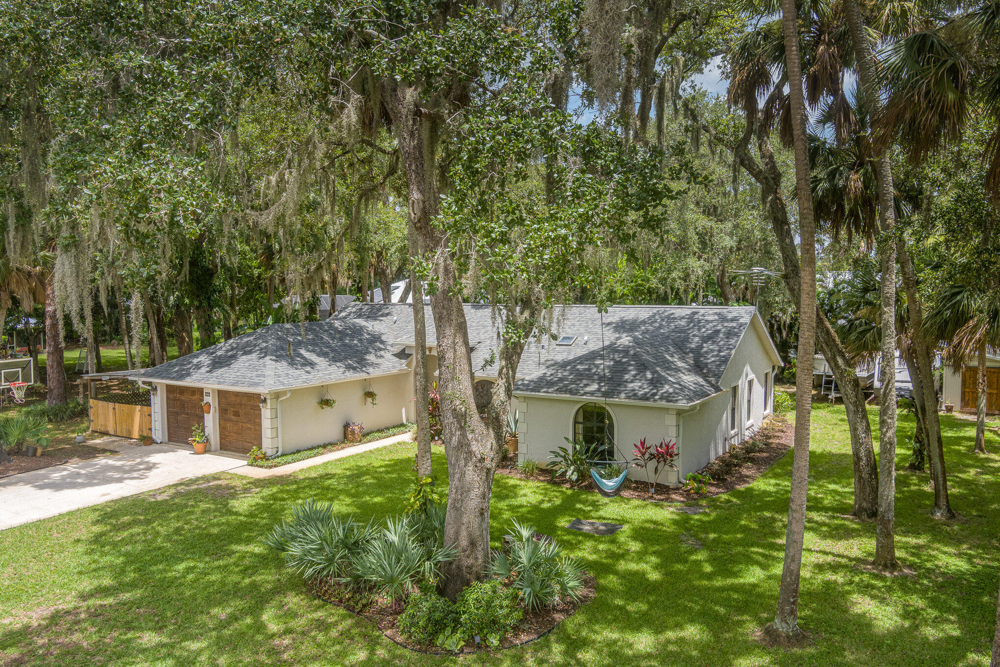 786 Seymour Road Northeast Palm Bay, FL 32905 - Photo 3 of 45 Lush Greenery