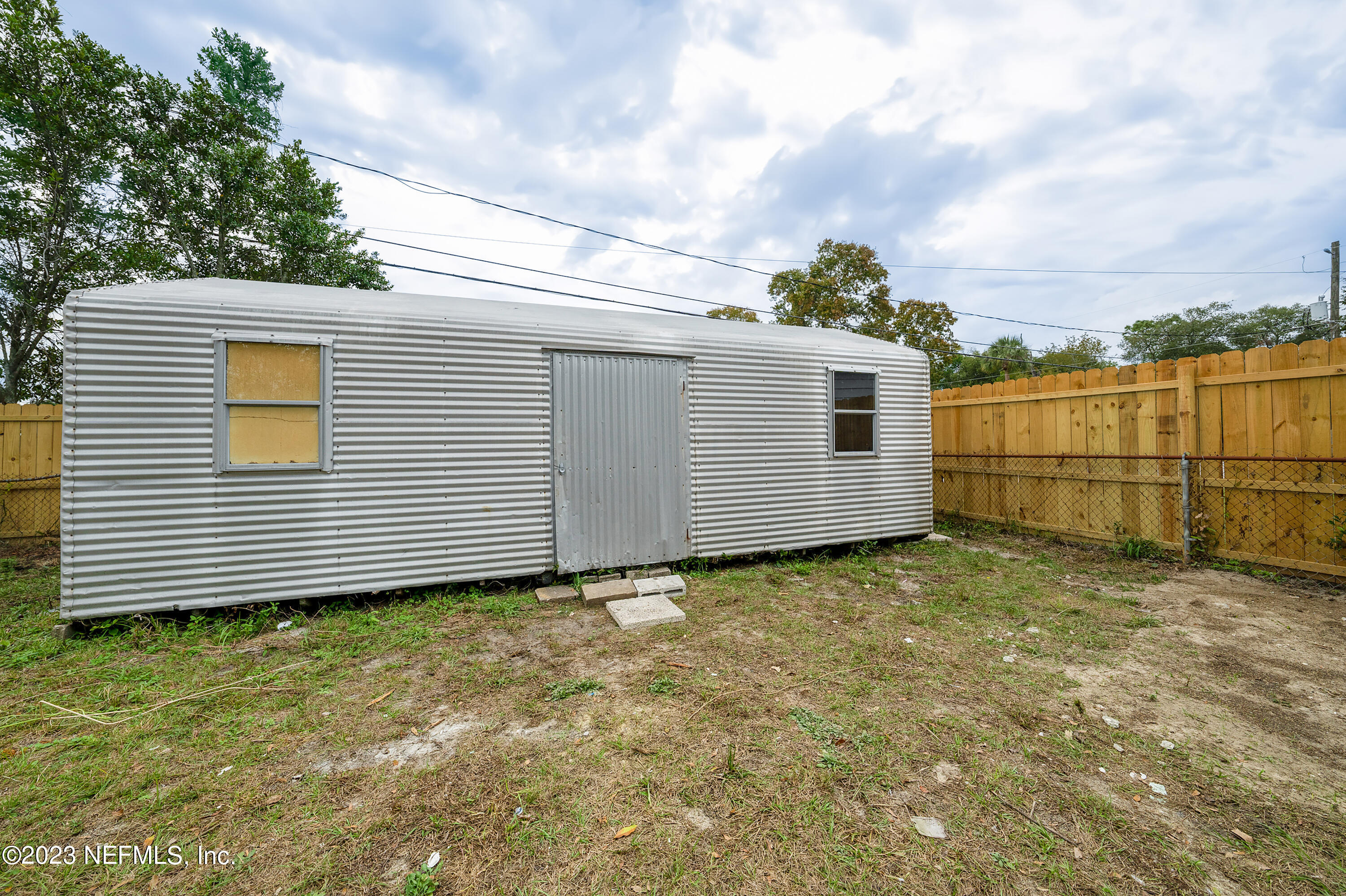 7404 Bamberg Road Jacksonville, FL 32277 - Photo 29 of 31 a view of a backyard