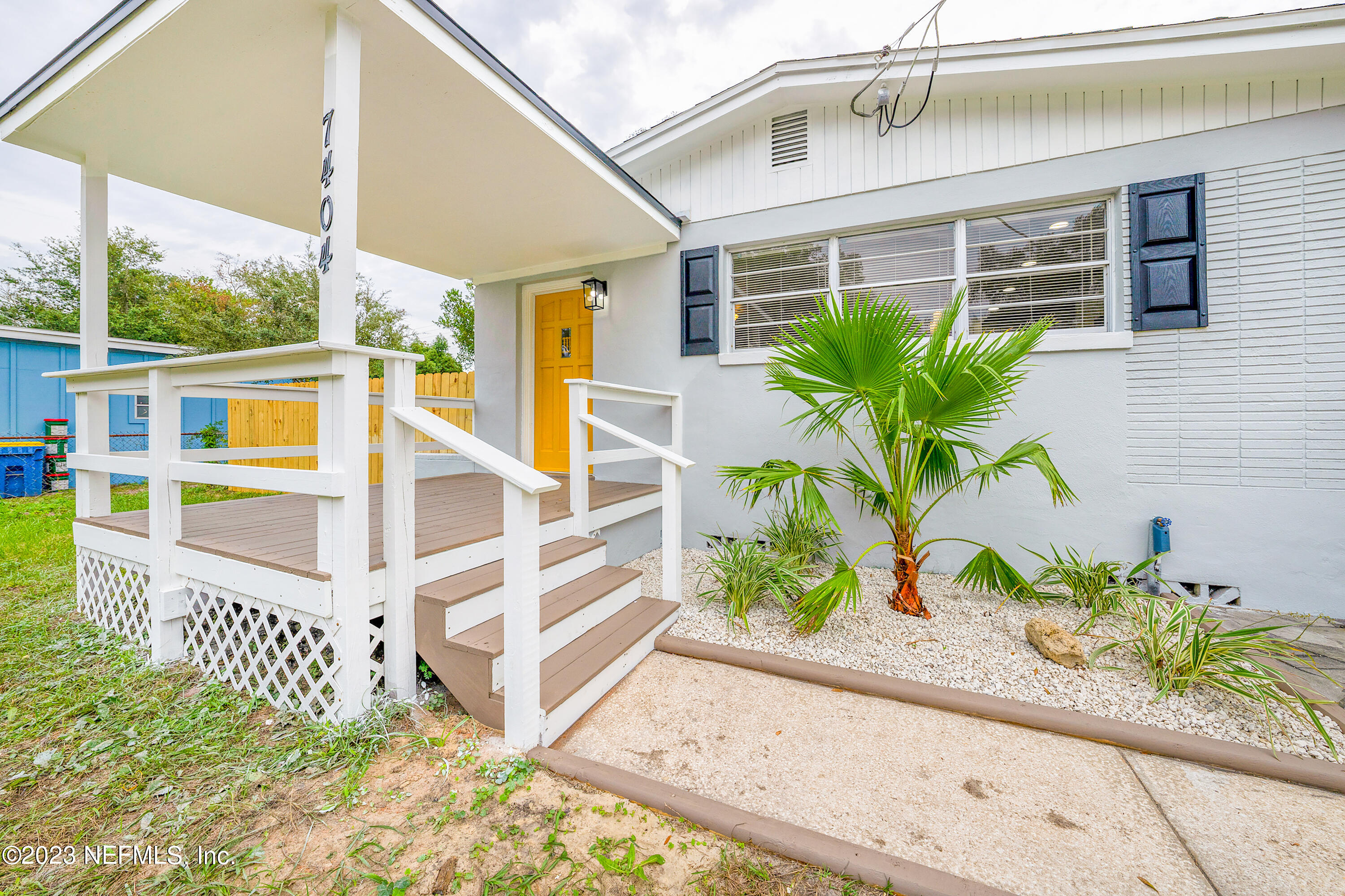 7404 Bamberg Road Jacksonville, FL 32277 - Photo 5 of 31 a front view of a house with a porch