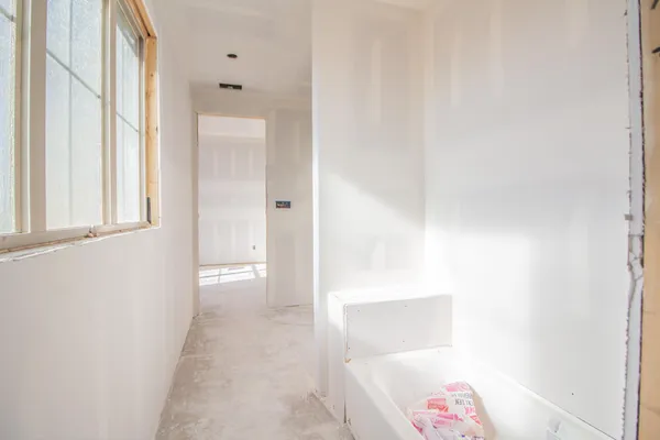 an empty room with windows